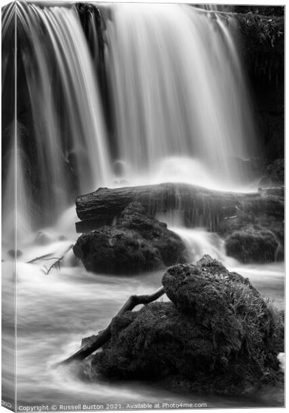 Water on rocks Canvas Print by Russell Burton