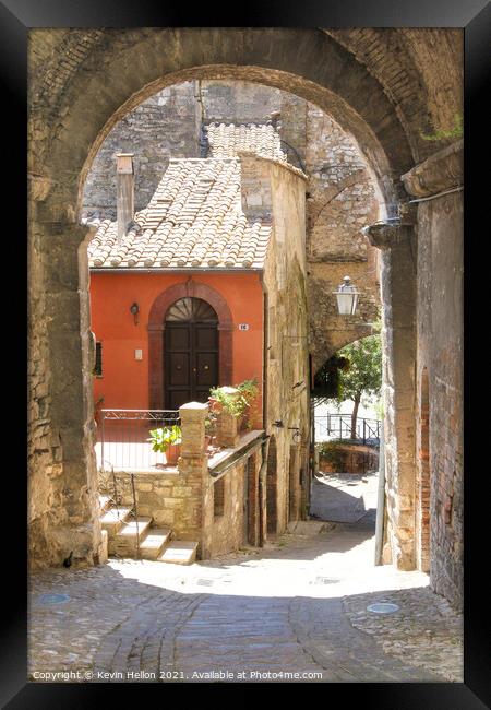 Narrow street in Narni Framed Print by Kevin Hellon
