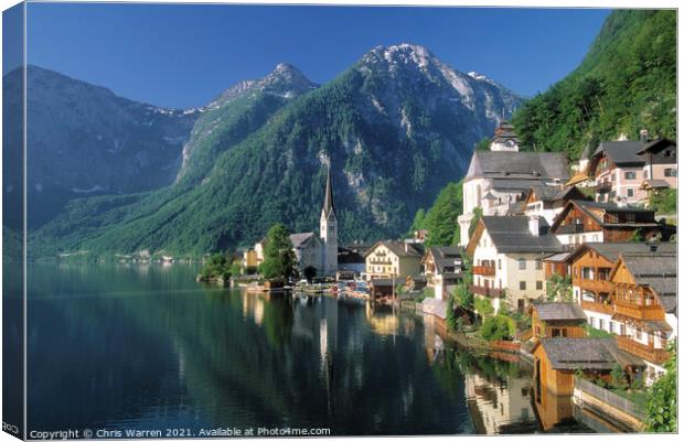 Lake Hallstattersee and the village of Hallstatt A Canvas Print by Chris Warren