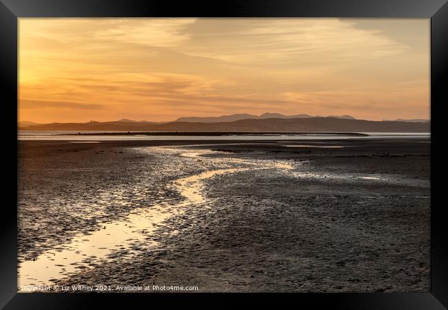 A sunset over Morecambe Bay Framed Print by Liz Withey