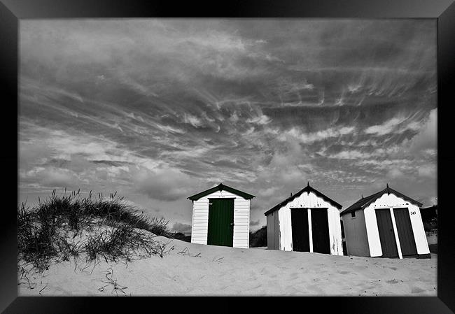 Clouds over Southwold Beach Huts Selective Framed Print by Paul Macro