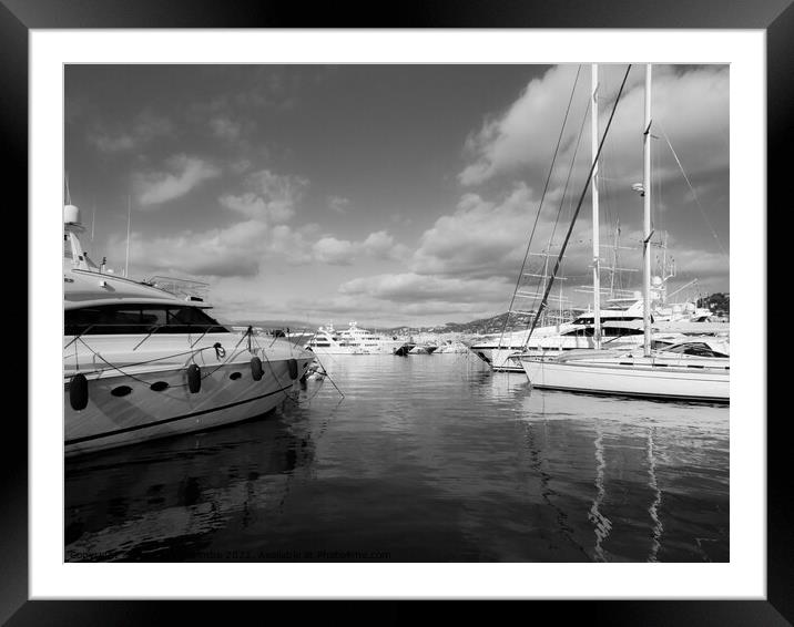 Monochrome One of the marinas in Cannes Framed Mounted Print by Ann Biddlecombe