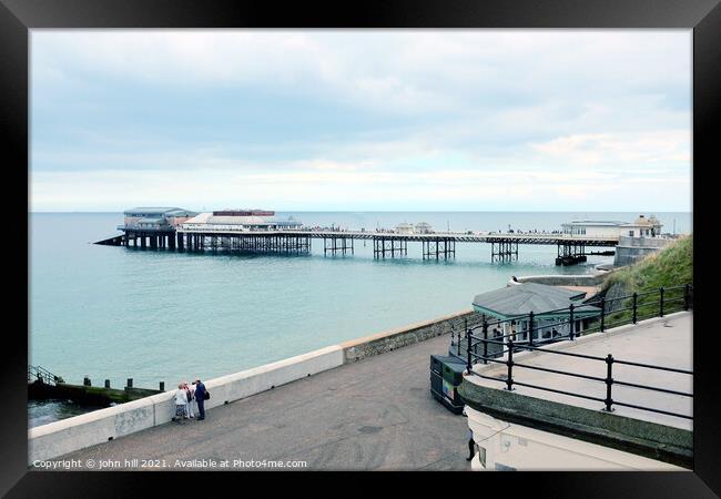 Cromer pier and lifeboat station. Framed Print by john hill