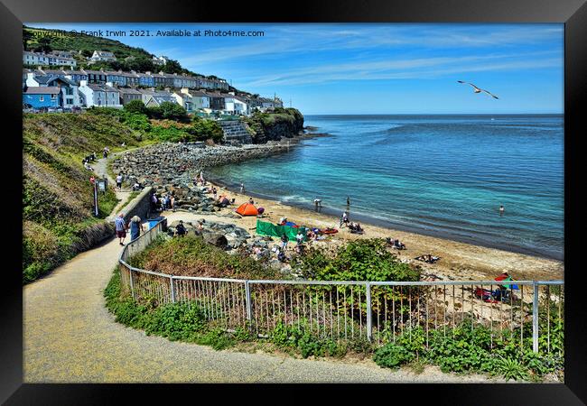 Enjoying time in the sunshine on New Quay beach Framed Print by Frank Irwin