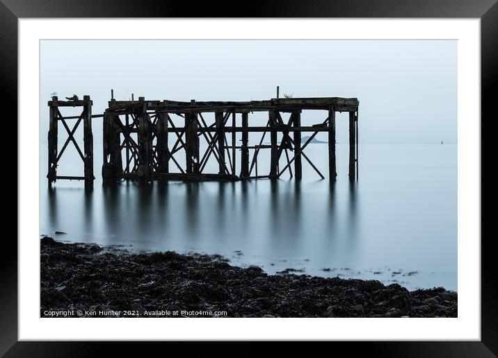A Pier to Nowhere Framed Mounted Print by Ken Hunter