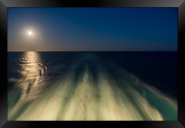 Moon over the wake of cruise ship travelling at speed Framed Print by Steve Heap