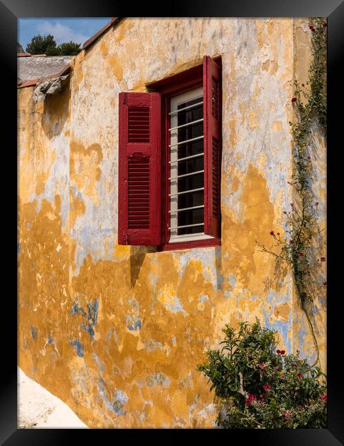 Red shutters on window in ancient district of Anafiotika in Athe Framed Print by Steve Heap