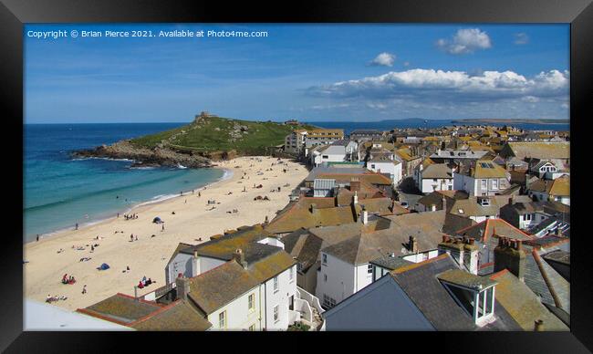 St Ives, Rooftops, Porthmeor Beach and the Island Framed Print by Brian Pierce