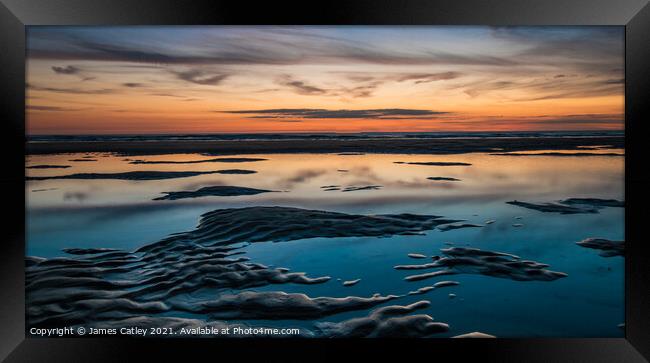Sunset reflections Framed Print by James Catley