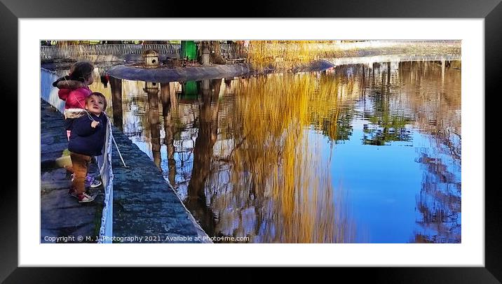 Kids enjoying in the lake view Framed Mounted Print by M. J. Photography