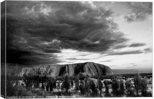 Storm Clouds over Uluru Canvas Print by Jonathan Bird