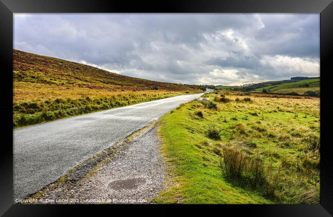 Moody sky over Forest of Bowland road Lancashire Framed Print by Dee Lister