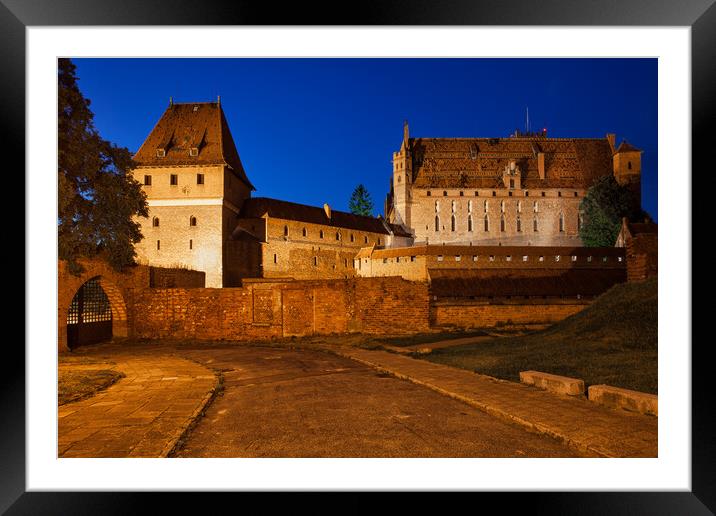Malbork Castle at Night in Poland Framed Mounted Print by Artur Bogacki