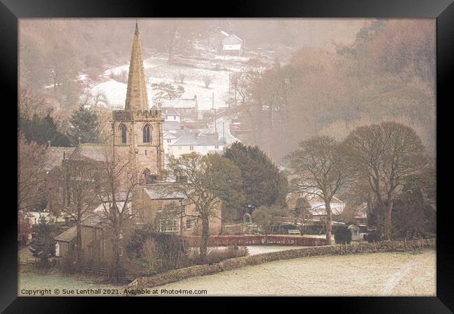 St Michael and All Angels Church with a snowy backdrop Framed Print by Sue Lenthall