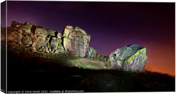 Last light  at the cow and calf rocks, Ilkley, Yorkshire. Canvas Print by Chris North