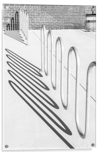 Bike rack shadows cast form abstract shapes on concrete Acrylic by Blok Photo 