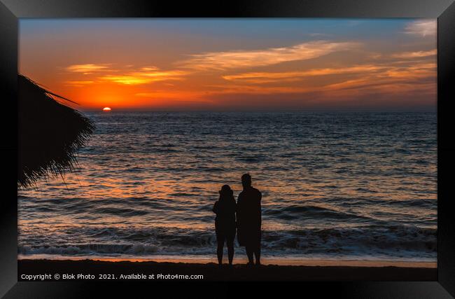 Remember when - a couple in silhouette share a moment, sand, sea and setting sun Framed Print by Blok Photo 