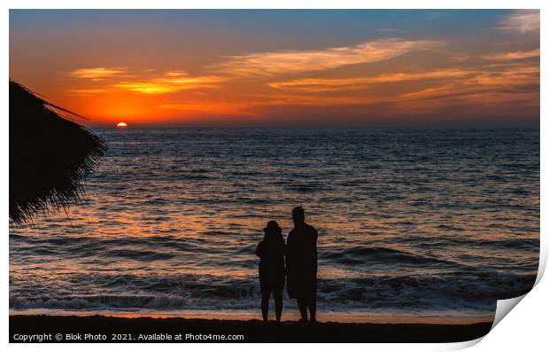 Remember when - a couple in silhouette share a moment, sand, sea and setting sun Print by Blok Photo 