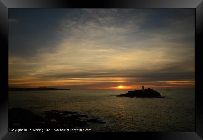 Sunset over Godrevy looking towards St Ives Framed Print by Ed Whiting
