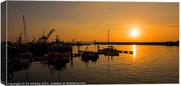 Sunrise over Newlyn Harbour Canvas Print by Ed Whiting