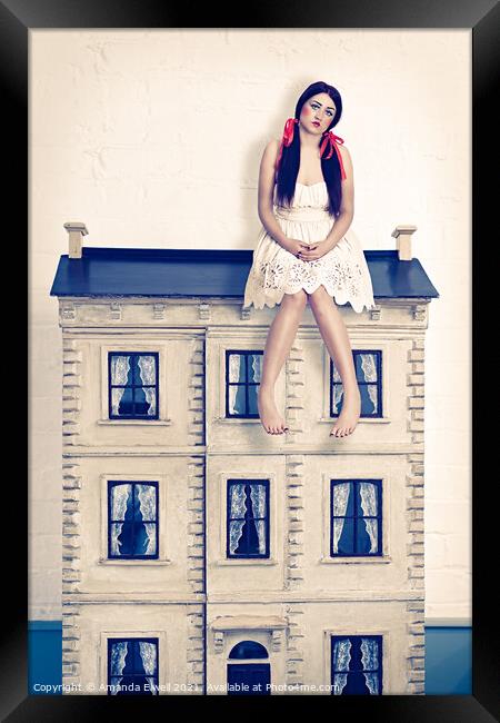 Sitting on a dolls house Framed Print by Amanda Elwell