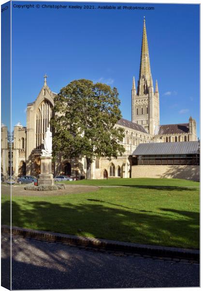 Blue skies at Norwich Cathedral Canvas Print by Christopher Keeley