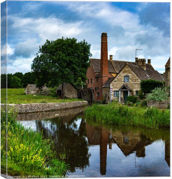 The mill at Lower Slaughter Canvas Print by Cliff Kinch