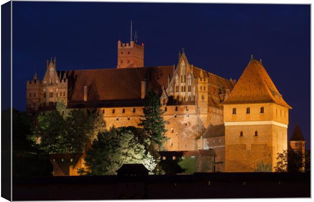 High Castle of the Malbork Castle at Night Canvas Print by Artur Bogacki