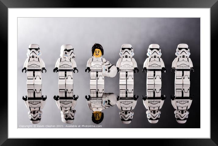 The force of attraction Framed Mounted Print by Kevin Clayton