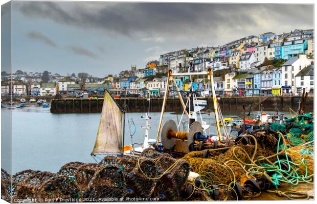 Pots and Nets at Brixham Harbour Canvas Print by Paul F Prestidge