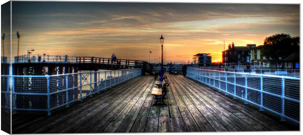 Lovers at sunset Pier  Hull  Canvas Print by Jon Fixter