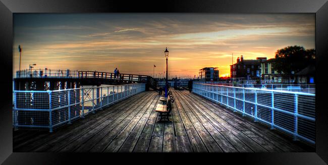 Lovers at sunset Pier  Hull  Framed Print by Jon Fixter