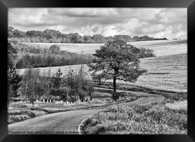 Monochrome landscape. Winding country road at The Hanningfields, Essex, UK Framed Print by Peter Bolton