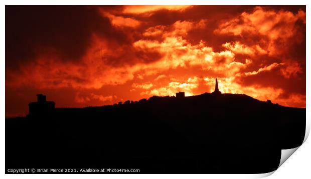 Fiery sunset over Carn Brea, Cornwall  Print by Brian Pierce