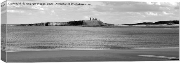 Dunstanburgh castle viewed from beach Canvas Print by Andrew Heaps