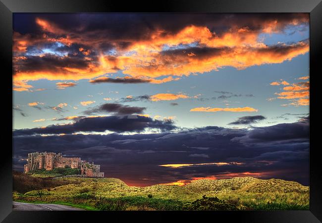 Bamburgh Castle At Sunset Framed Print by Ian Jeffrey