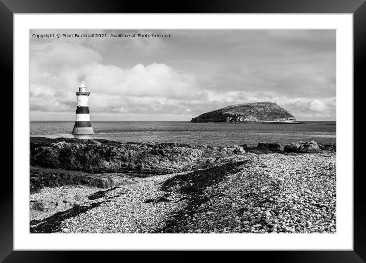Penmon Point and Puffin Island on Anglesey in Mono Framed Mounted Print by Pearl Bucknall