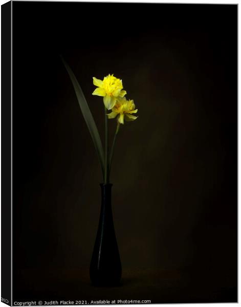 Double daffodils in a vase Canvas Print by Judith Flacke