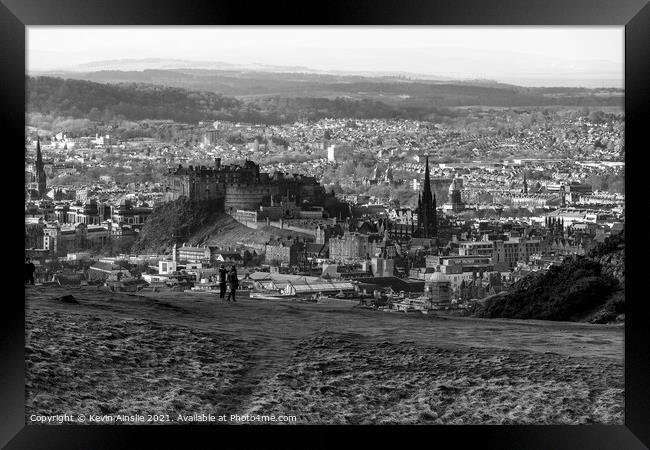 Edinburgh below Arthurs Seat Framed Print by Kevin Ainslie