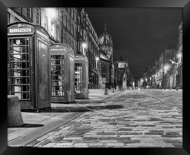 Looking up the royal mile Framed Print by Kevin Ainslie