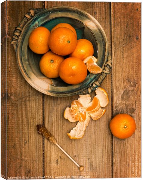 Clementines On Wooden Board Canvas Print by Amanda Elwell