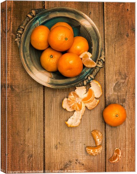 Clementines On Wooden Board Canvas Print by Amanda Elwell