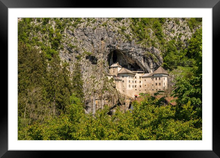 Predjama castle built into a cave in Slovenia Framed Mounted Print by Steve Heap