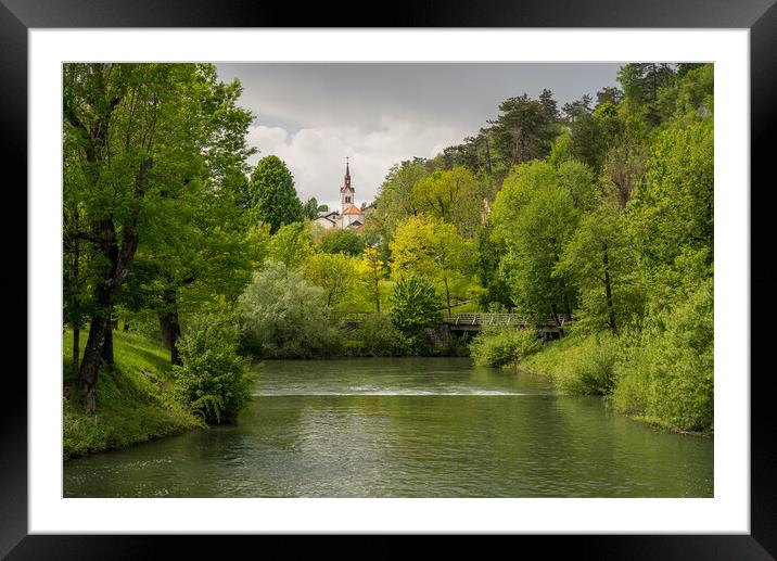 Calm peaceful river in the park near Postojna cave system in Slo Framed Mounted Print by Steve Heap