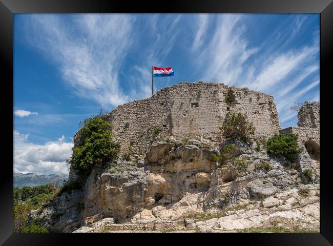 Flag on top of fortress above the Croatian town of Novigrad in I Framed Print by Steve Heap