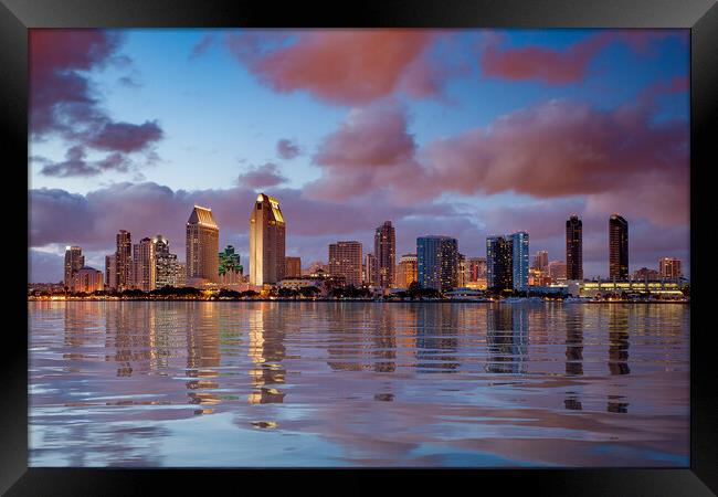 San Diego skyline at dusk reflected in sea Framed Print by Steve Heap