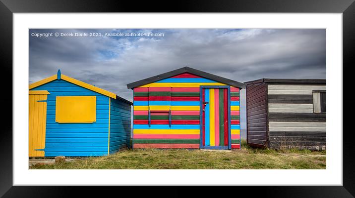 Colourful beach huts at Hopeman Framed Mounted Print by Derek Daniel