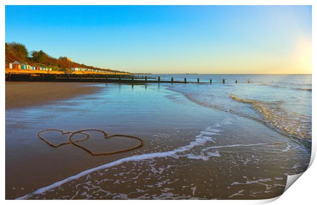 Hearts in the sand at Frinton-on-Sea Print by Paula Tracy