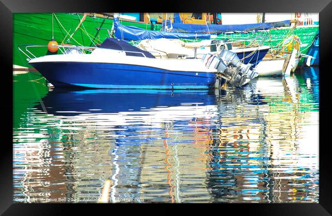 Stunning reflections of blue and green boats in th Framed Print by Dave Bell