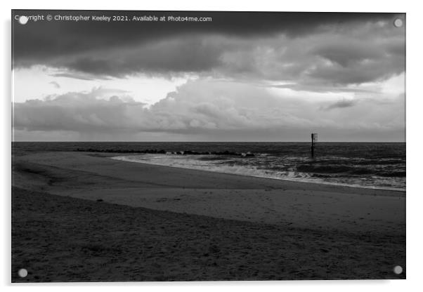 Moody, cloudy skies over Caister beach  Acrylic by Christopher Keeley